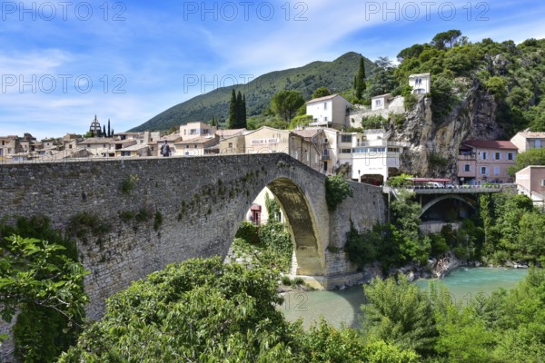 The Pont de Nyons, medieval stone arch bridge over the river Eygues in the municipality of Nyons in