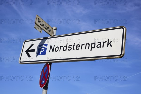 Signpost to Nordsternpark in front of a blue sky in Gelsenkirchen, Ruhr area, independent city,