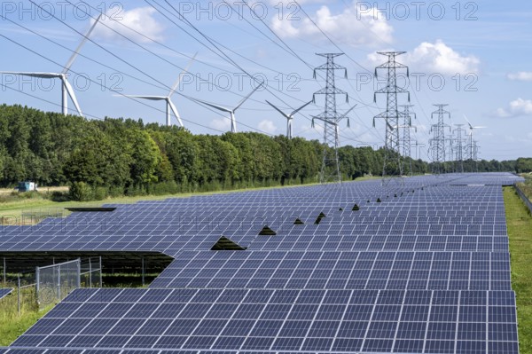 High-voltage power line route, the space underneath is used for a solar park over 5 km long, behind