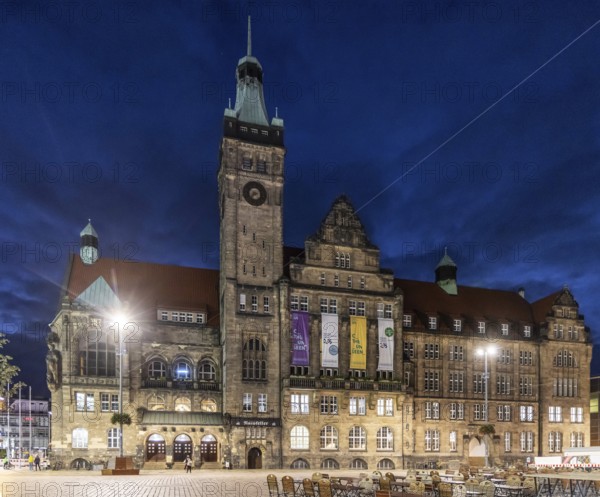 The New Chemnitz City Hall, city administration in the evening. Advertising banner for the European