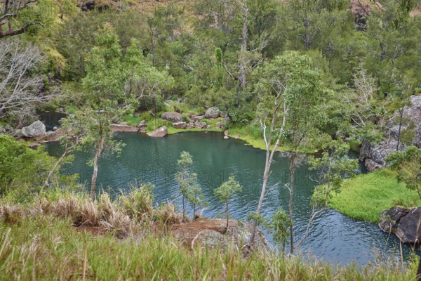 Nature landscape of a little lake from the Small Millstream Falls near Cairns in spring,