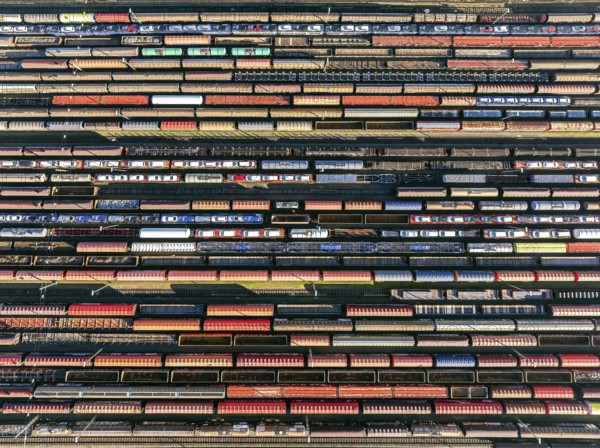 Deutsche Bahn AG marshalling yard. Many goods trains are parked on the tracks with tank wagons, car
