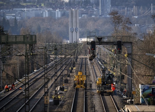 Labourers working with Liebherr A922 Rail Litronic and Kuhnle RR14 EVO 3 Rail two-way working