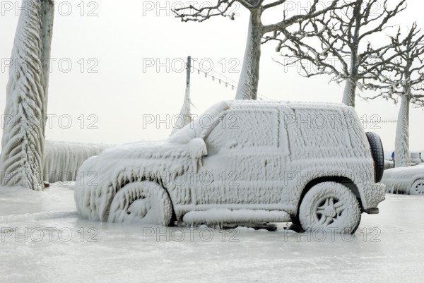 Car covered with ice, ice sheet, ice shield, Lake Geneva, Versoix, Canton Geneva, Switzerland,