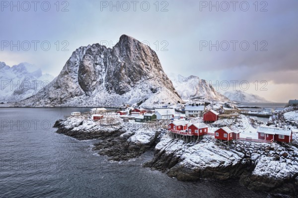 Famous tourist attraction Hamnoy fishing village on Lofoten Islands, Norway with red rorbu houses