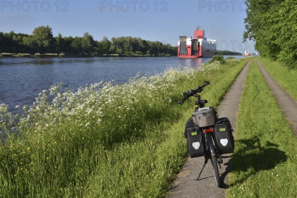 Bicycle tour along the Kiel Canal with ship sightseeing, Germany, Europe