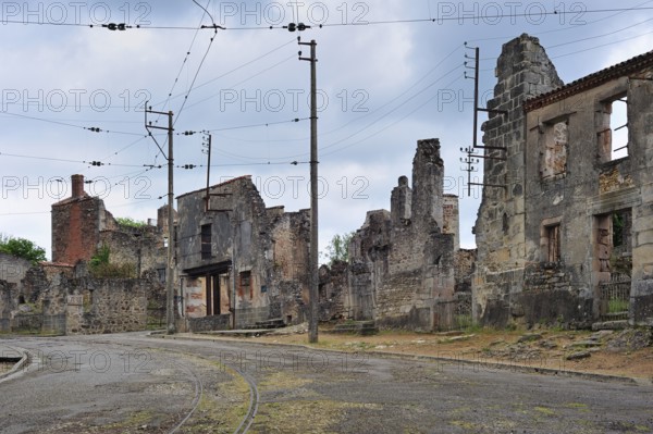 Ruins along the main road The burnt village of Oradour-sur-Glane was destroyed on 10 June 1944 when