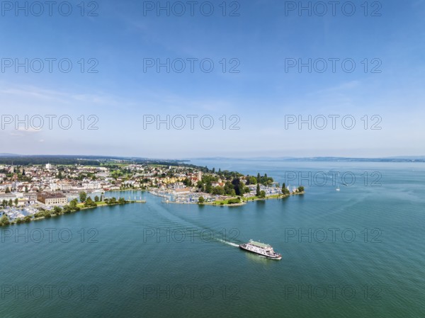 Harbour area, ferry port, yacht harbour, marina of Romanshorn with Seepark and the departing ferry