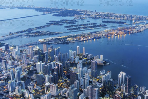 Aerial view of Miami skyline with skyscrapers Downtown Brickell and Miami Beach at night in Miami,