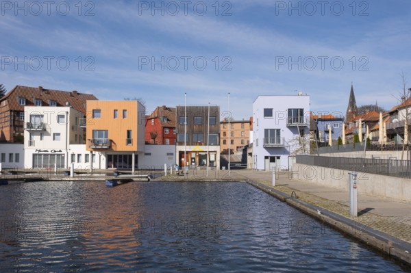 Modern buildings at the town harbour, Malchow, island town, Mecklenburg Lake District, Mecklenburg,