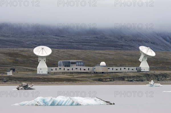 Earth Observatory station with two VLBI antennas and SRL building at research town Ny-Alesund,