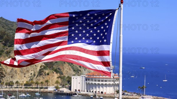 American star spangled flag waving in California. A large American flag is flying high above