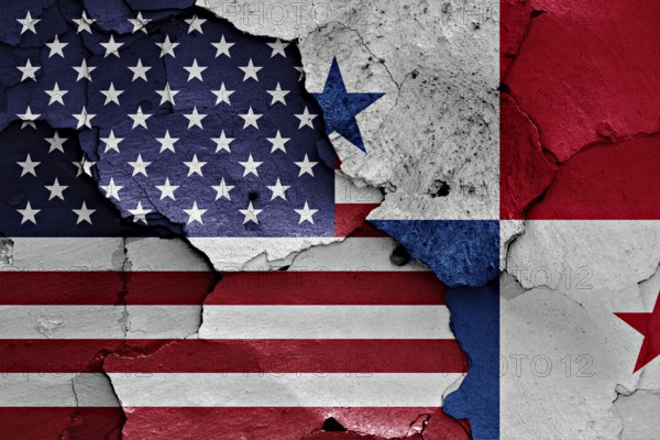 Flags of USA and Panama painted on cracked wall
