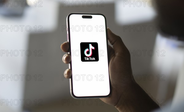 Tik Tok logo on smartphone