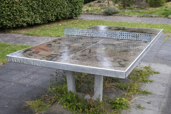 Table tennis table outside in the rain