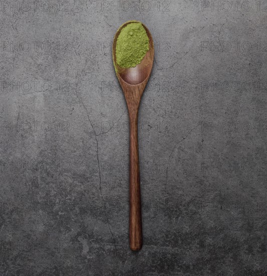 Flat lay matcha tea powder wooden spoon