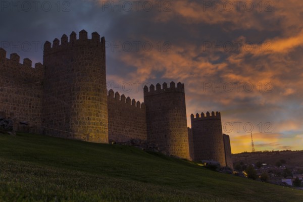 Avila city wall one afternoon with a beautiful sunset, Spain, Europe