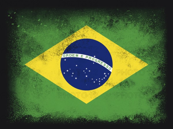 Brazil Flag design composition of exploding powder and paint, isolated on a black background for