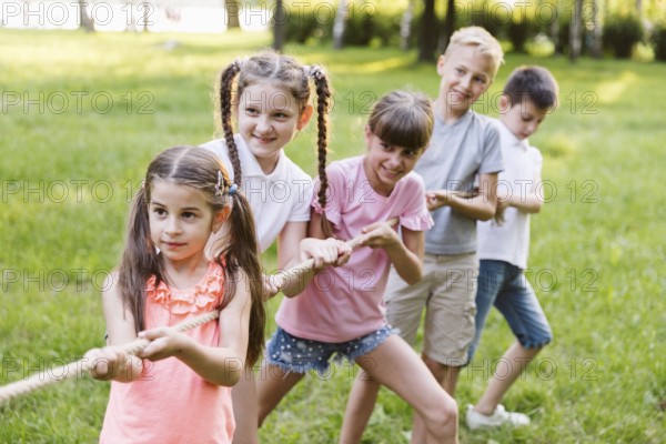 Kids having fun tug war