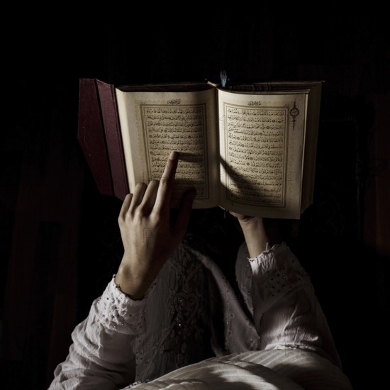 Silhouette woman reading quran. Resolution and high quality beautiful photo