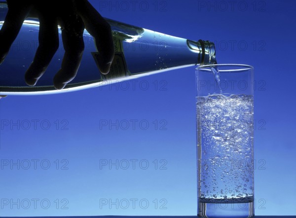 Bottle and Glass of Sparkling Water