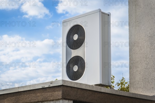 A heat pump on the roof of a garage in Langenfeld, Germany, Europe