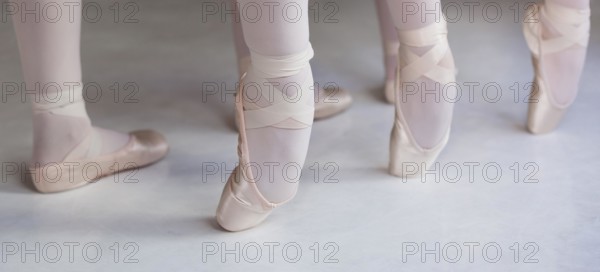 Professional ballet dancers training together pointe shoes