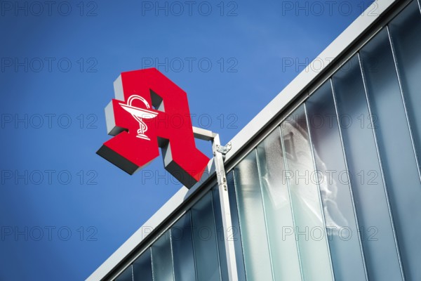 Pharmacy sign on a house facade in Düsseldorf, Germany, Europe