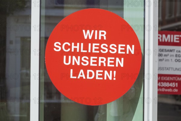 Sign we close our shop on a shop window, Germany, Europe