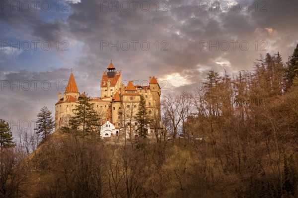 Beautiful panoramic view of Dracula Bran medieval castle in the sunset light, Transylvania,