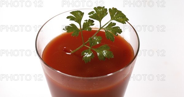 Parsley (Petroselinum crispum), falling into tomatoe's Juice