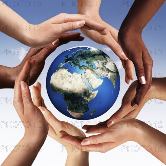 Conceptual peace and cultural diversity symbol of multiracial hands making a circle together around