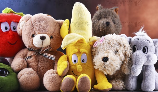 Group of stuffed animal toys in a children's room