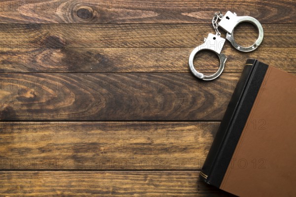 Top view frame with book handcuffs