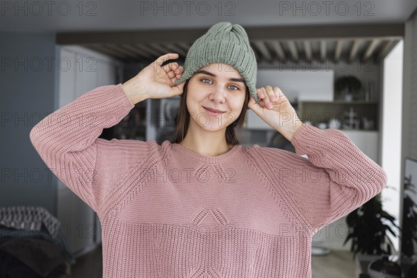 Portrait woman wearing knitted cap 3
