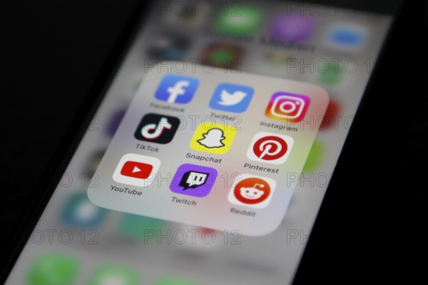 Social media icon, detailed view of a smartphone with social media apps, Facebook, Twitter,