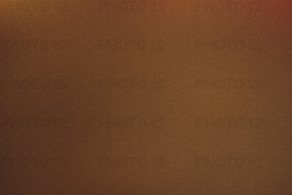 High grain photo of a warm brown gradient, ideal for backgrounds