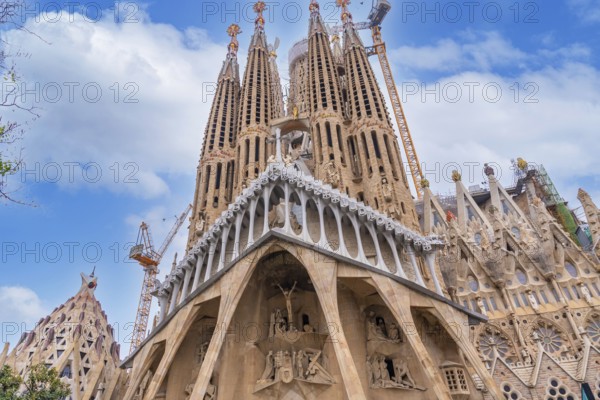 Detail of the door facade of the Basilica of the Sagrada Familia in Barcelona, Spain, Europe