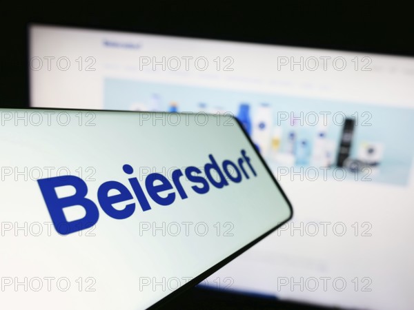 Stuttgart, Germany, 09-09-2023: Cellphone with logo of German consumer goods company Beiersdorf AG