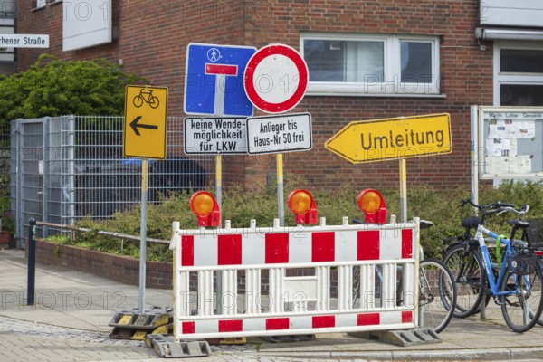 Traffic signs Barrier, Road closure, No entry, Residents free, Forest of signs, Bremen, Germany,