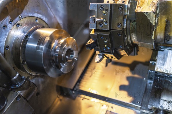 Close-up of an industrial lathe in a cnc factory with no people