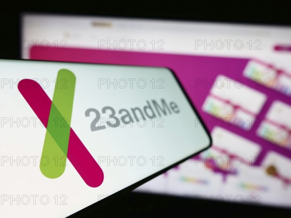 Stuttgart, Germany, 11-03-2023: Mobile phone with logo of American biotechnology company 23andMe