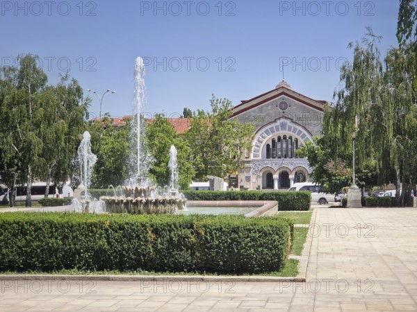Chisinau railway station with a view from the square with splashing fountain, Republic of Moldova