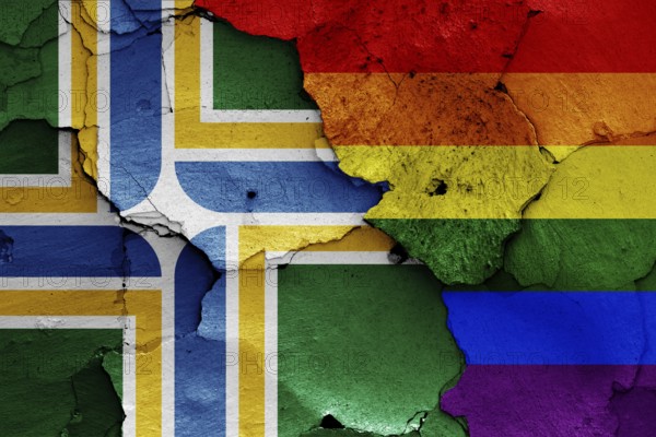 Flags of Portland and LGBT painted on cracked wall