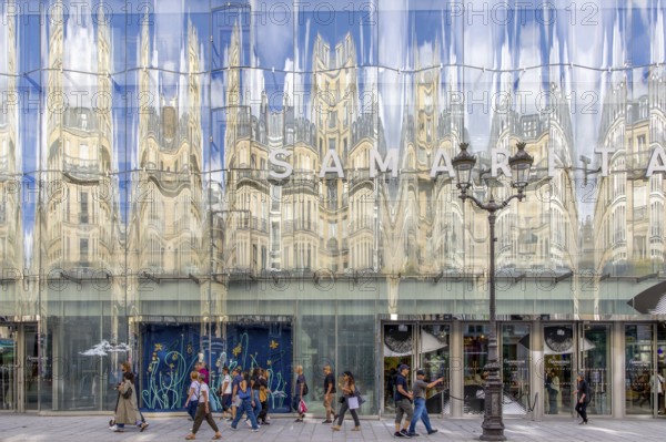 Shop window facade with reflection, La Samaritaine, since 1869 exclusive luxury goods department