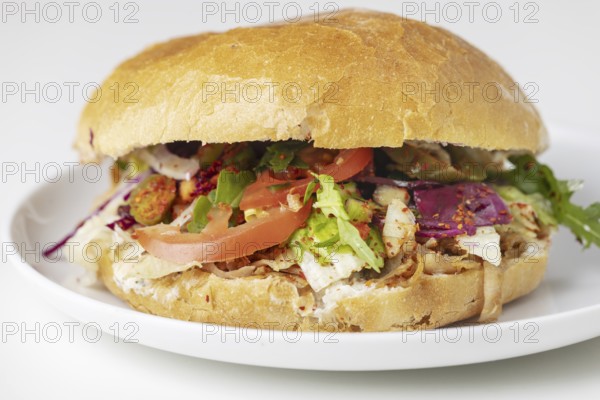 Döner kebap on a white plate
