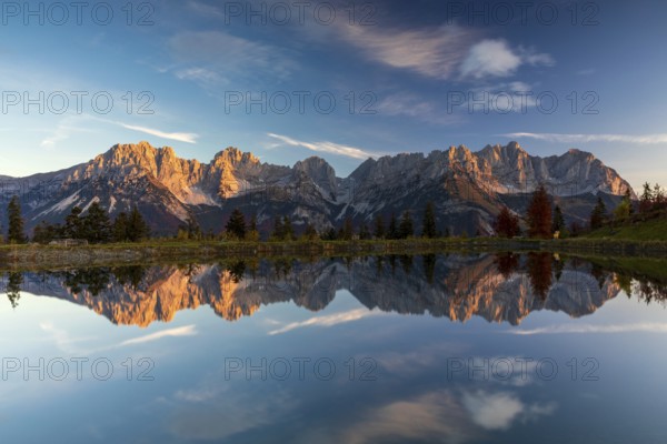 Alpenglow at the Wilder Kaiser reflected in the Astbergsee, Going, Tyrol, Austria, Europe