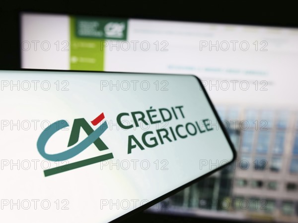 Stuttgart, Germany, 11-16-2023: Smartphone with logo of French financial services company Crédit