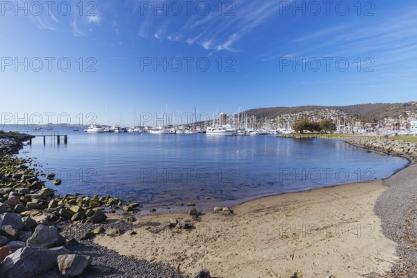 HOBART, AUSTRALIA, SEPTEMBER 15, 2022: A view towards Sandy Bay from Errol Flynn Reserve on a