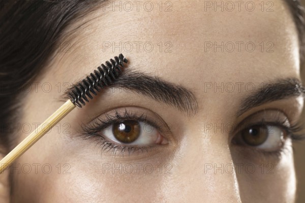Woman taking care her eyebrows. Resolution and high quality beautiful photo
